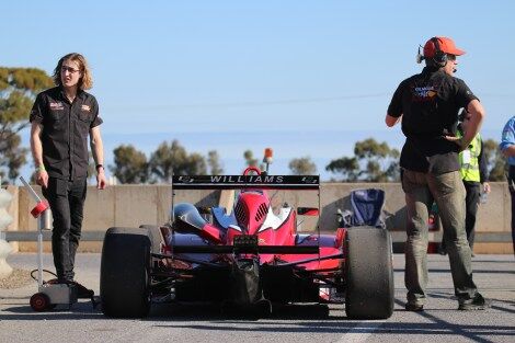 Callum Barker and Scott Rogers by Calan's side on the grid