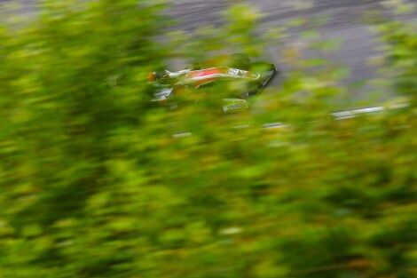 Calan Williams on the racing track behind the trees