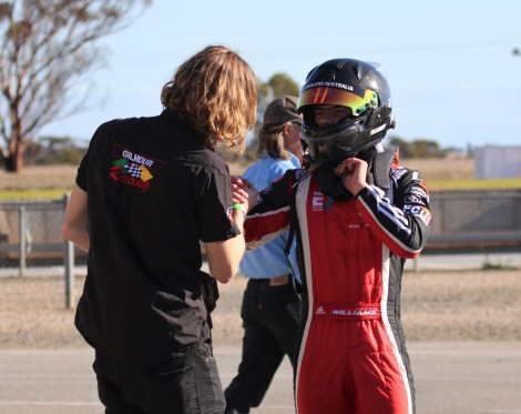 Calan Williams putting the helmet on